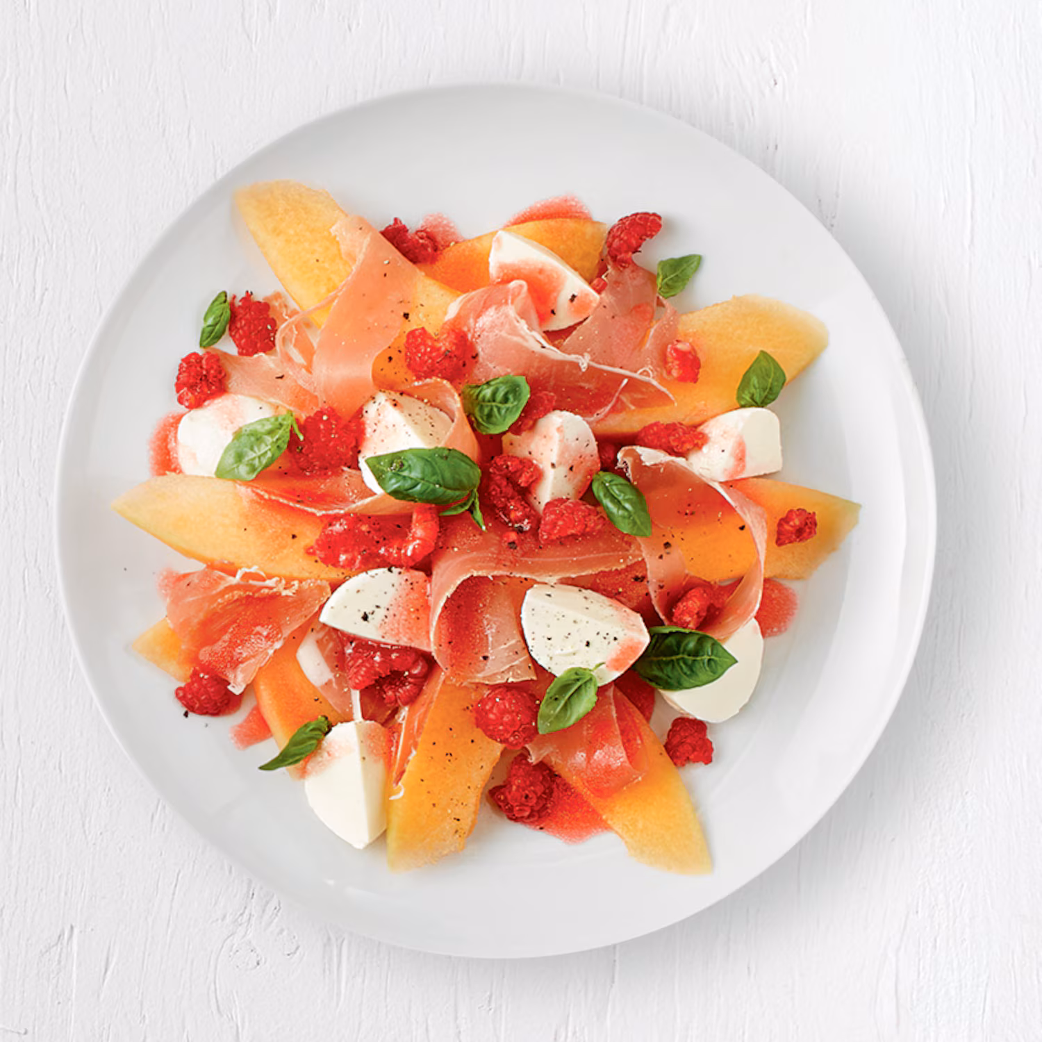 Salade de cantaloup, vinaigrette aux framboises